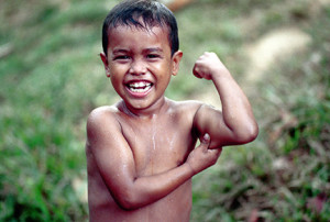 Young Nicaraguan boy displaying his commitment and hope for a good life. Photo: Langelle